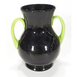 Opaque black and green glass twin handled …
