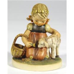 Hand painted Hummel figure of a girl feedi…