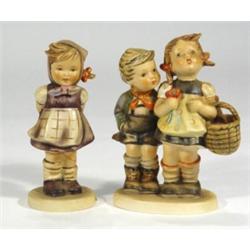 Hand painted Hummel figure group of a boy …