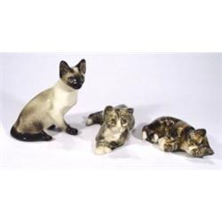 Three hand painted Winstanley cats with gl…