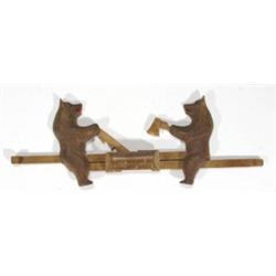 Carved Black Forest sliding bears cutting …