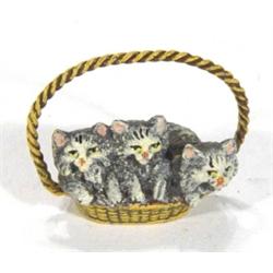 Cold painted bronze kitten group in a bask…