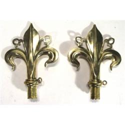 Pair of cast brass fleur-de-lis shaped bra…