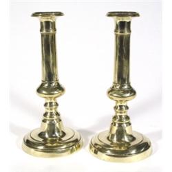 Pair of circular based brass candlesticks,…
