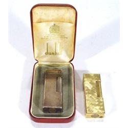 Boxed Dunhill silver plated lighter togeth…