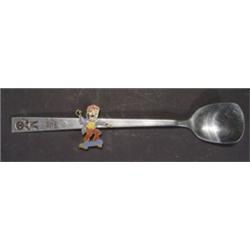 Robinson golliwog spoon and an enamelled b…