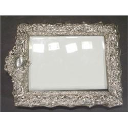 Rectangular silver photo frame, heavily em…