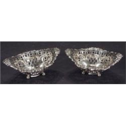 Pair of pierced silver salts, embossed wit…