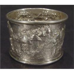 Indian silver napkin ring decorated with f…