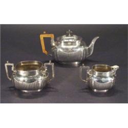 Three piece silver plated teaset with acan…