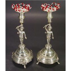 Pair of silver plated candlesticks, modell…