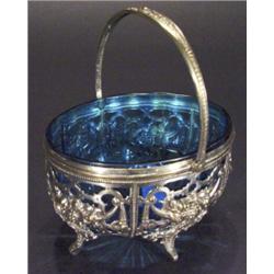 Ornate silver plated basket, embossed with…