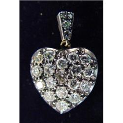 Yellow and white gold heart shaped diamond…