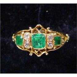 Gold emerald and diamond ring…