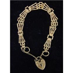 9ct gold gate bracelet with floral heart s…