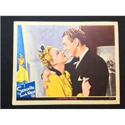 1945 "SENORITA FROM THE WEST" LOBBY SCENE CARD, SIGNED BY ALLAN JONES