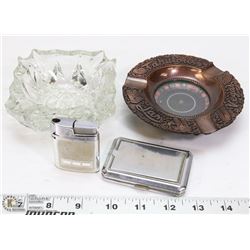 2 ASHTRAYS, A LIGHTER, AND CIGARETTE CASE COMPACT.