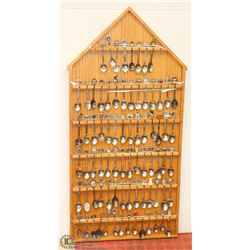 LARGE SPOON RACK OF COLLECTOR SPOONS.