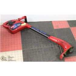 TORO 12 VOLT BATTERY TRIMMER WITH CHARGER.