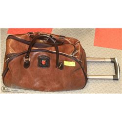 VINTAGE SKYWALKER LEATHER ROLLING CARRY ON BAG.