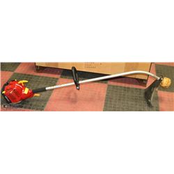 HOMELITE GAS POWERED GRAS TRIMMER.