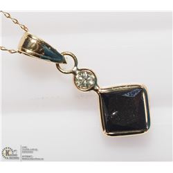 44) 10K BLACK & WHITE DIAMOND NECKLACE