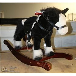PLUSH ROCKING HORSE WITH SOUND.