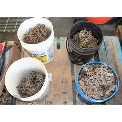 LOT OF 4-5 GALLON PAILS FULL OF TIRE CHAINS