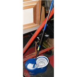 NEW MOP PAIL AND MOP.