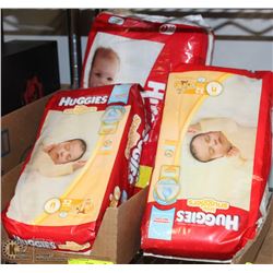 3 PACKAGES OF HUGGIES DIAPERS INCL 2 SIZE NEWBORN