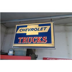 Chevy truck signs in shop