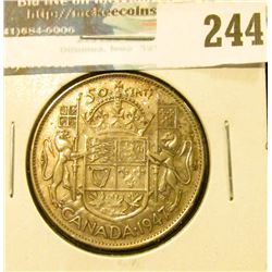 1947 Curved 7 Canada Silver Half-Dollar.