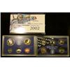 Image 2 : 2002 S U.S. Cameo Frosted Proof Set in original box as issued. Contains Sacagawea Dollar and State Q
