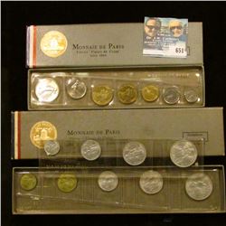 TWO FRENCH MONNAIE DE PARIS PIECES "FLEUR DE COINS" COIN SETS. ONE IS DATED 1964 AND HAS A SILVER FI