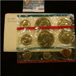 1044 _ 1975 P & D U.S. Mint Set in original government holder as issued. With scarce Type One Dollar