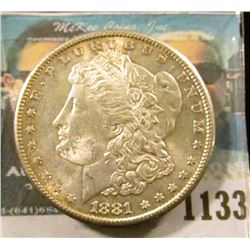 1133 _ 1881 S U.S. Morgan Silver Dollar, Gem BU with original toning.