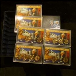 1168 _ Six plastic cases with Presidential Dollars in a storage box. (11 BU Dollar Coins included).