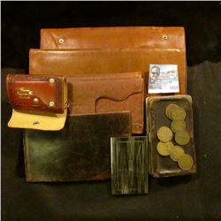 1434 _ Gold-colored "Kreisler: Card Case (new condition); leather with metal trim coin wallet; (4) l