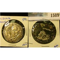 1589 _ (2) Liberia Five Dollar Coins Including One With George W Bush And The Other Has The Scene Of