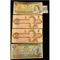 1802 _ Series 1979 $5, (2) Series 1986 $2, & 1973 One Dollar Banknotes from Canada.