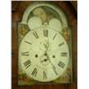 Image 1 : An early 19th Century mahogany 8 day longcase clock, the 16in. arched painted dial with moonphase...