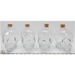 LOT OF 4 SKULL SHAPED JARS WITH CORKS