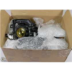 PAIR OF NEW YELLOW FOG LIGHTS.