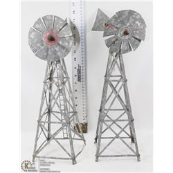 TWO RUSTIC GALVANIZED METAL WINDMILLS