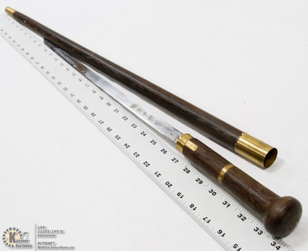 COLLECTOR WOOD CANE WITH HIDDEN SWORD