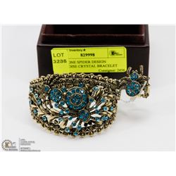 GOLDTONE SPIDER DESIGN TURQUOISE CRYSTAL BRACELET