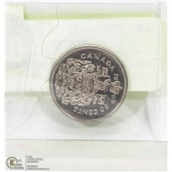 1969 CANADIAN 50 CENT PIECE.