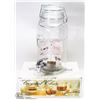 Image 1 : LARGE FLAT WITH 1 GALLON JAR LIKE DISPENSER AND