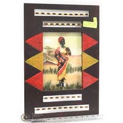 AFRICAN WOMAN IN WOOD FRAMED SHADOW