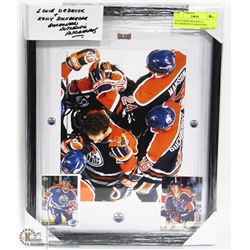 LOUIE DEBRUSK & KELLY BUCHBERGER GUARANTEED